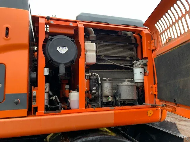 2011 doosan dx140w banden graafmachine - afbeelding 4 van  60