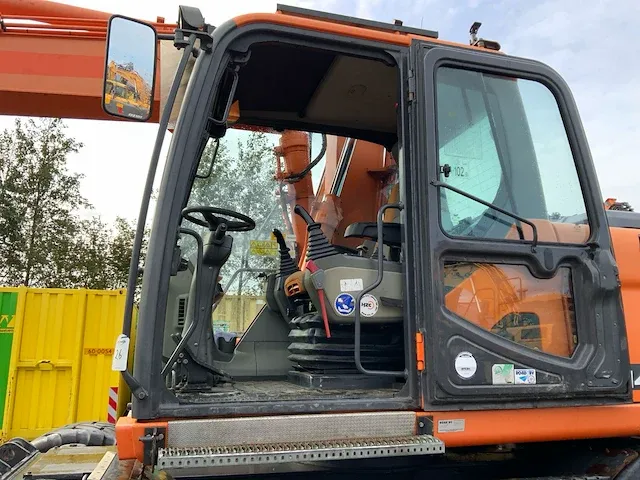 2011 doosan dx140w banden graafmachine - afbeelding 10 van  60