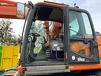 2011 doosan dx140w banden graafmachine - afbeelding 10 van  60