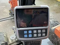 2011 doosan dx140w banden graafmachine - afbeelding 20 van  60