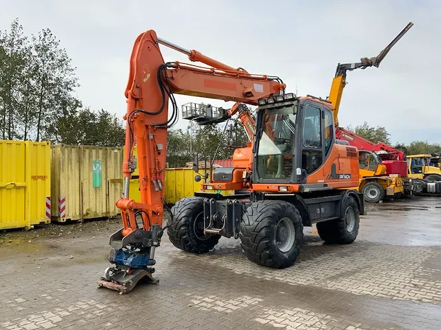 2011 doosan dx140w banden graafmachine - afbeelding 12 van  60