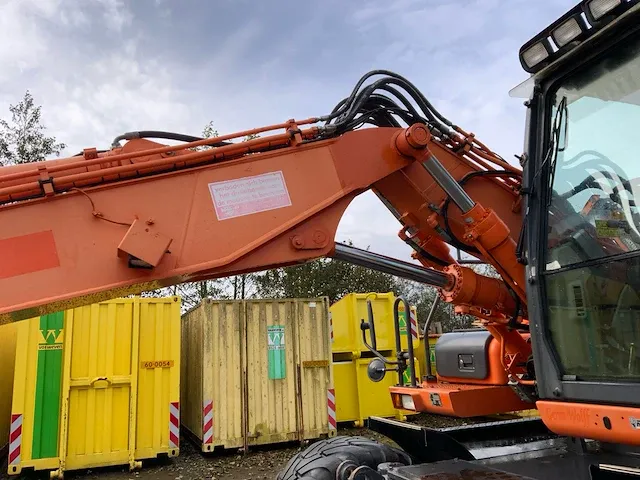 2011 doosan dx140w banden graafmachine - afbeelding 25 van  60