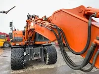 2011 doosan dx140w banden graafmachine - afbeelding 35 van  60