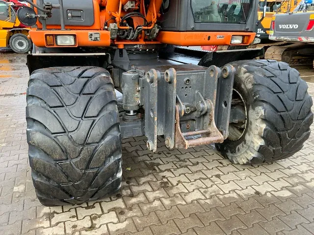 2011 doosan dx140w banden graafmachine - afbeelding 36 van  60