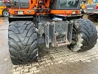 2011 doosan dx140w banden graafmachine - afbeelding 36 van  60