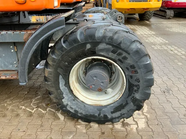 2011 doosan dx140w banden graafmachine - afbeelding 38 van  60