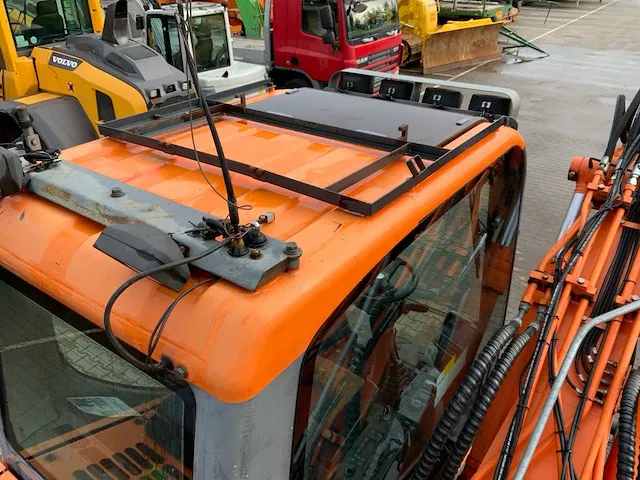 2011 doosan dx140w banden graafmachine - afbeelding 50 van  60