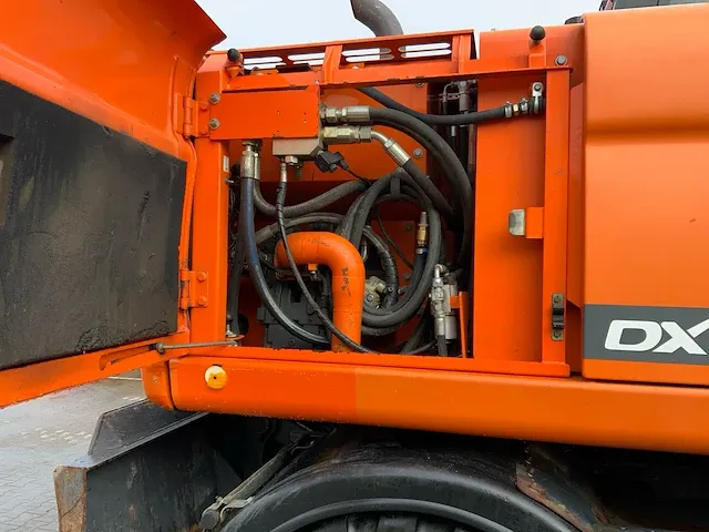2011 doosan dx140w banden graafmachine - afbeelding 51 van  60