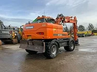 2011 doosan dx140w banden graafmachine - afbeelding 45 van  60