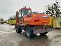 2011 doosan dx140w banden graafmachine - afbeelding 58 van  60