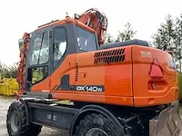 2011 doosan dx140w banden graafmachine - afbeelding 60 van  60