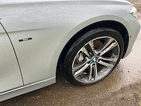 2012 bmw 3-serie 335i high executive personenauto - afbeelding 7 van  32