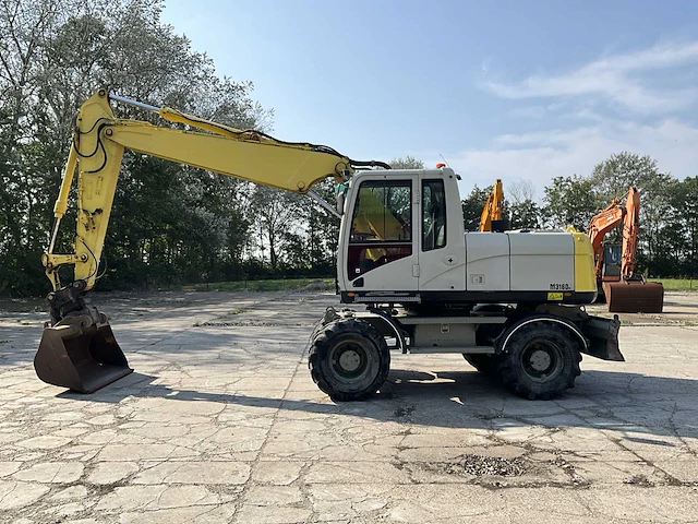 2012 caterpillar m316d banden graafmachine - afbeelding 3 van  44