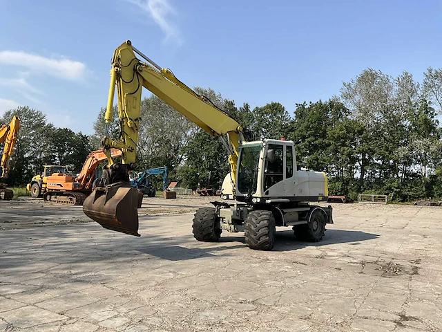 2012 caterpillar m316d banden graafmachine - afbeelding 8 van  44