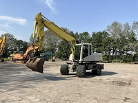2012 caterpillar m316d banden graafmachine - afbeelding 8 van  44