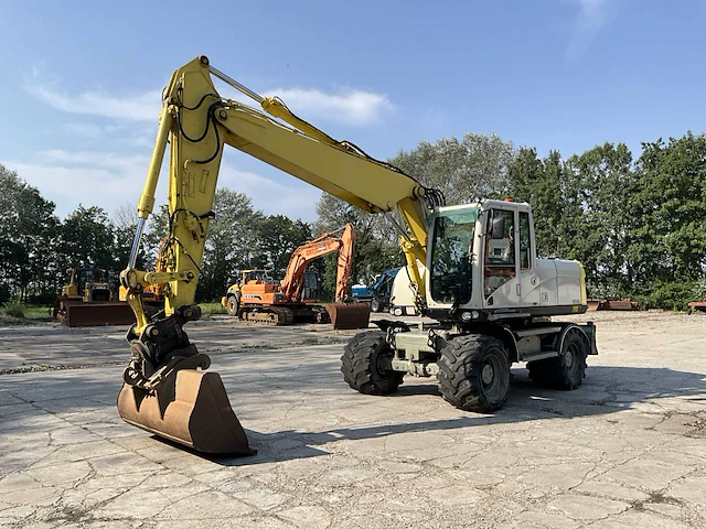 2012 caterpillar m316d banden graafmachine - afbeelding 1 van  44