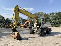 2012 caterpillar m316d banden graafmachine