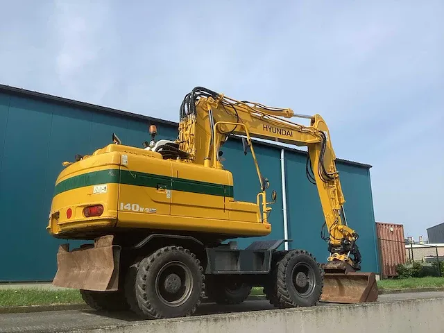 2013 hyundai robex 140w banden graafmachine - afbeelding 34 van  44