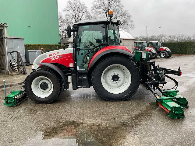 2015 steyr 4075 kompact vierwielaangedreven landbouwtractor met ransomes kooimaaier. - afbeelding 34 van  57