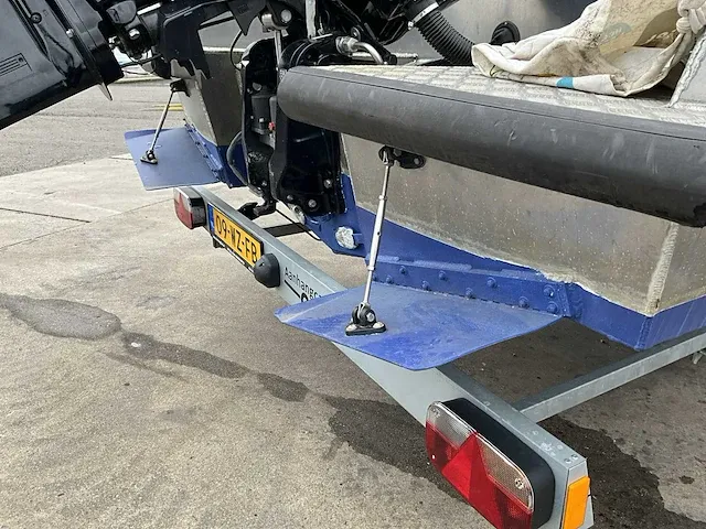 2016 vanvossen alu tender 650 cabin consoleboot inclusief trailer - afbeelding 10 van  32