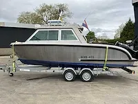 2016 vanvossen alu tender 650 cabin consoleboot inclusief trailer - afbeelding 3 van  32