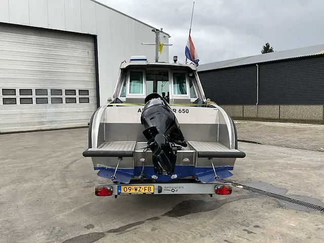 2016 vanvossen alu tender 650 cabin consoleboot inclusief trailer - afbeelding 5 van  32