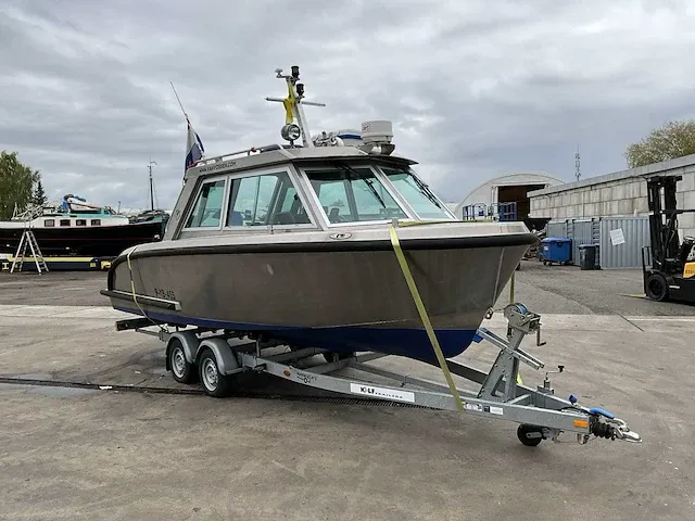 2016 vanvossen alu tender 650 cabin consoleboot inclusief trailer - afbeelding 8 van  32
