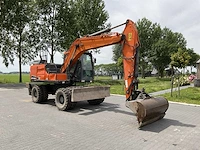 2017 doosan dx140w-5 banden graafmachine - afbeelding 34 van  42