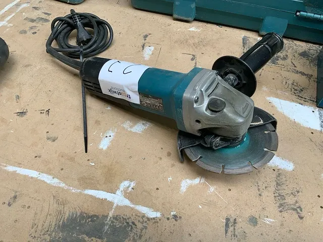 2017 makita 9558hnr haakse slijpmachine - afbeelding 1 van  4