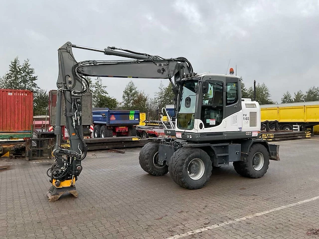 2018 komatsu pw148-10 banden graafmachine - afbeelding 1 van  42