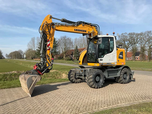2019 liebherr a914 compact litronic banden graafmachine - afbeelding 1 van  40