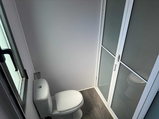 2025 rhino-cross-containers 1 deur en 3 ramen zwart 40ft hq/12 m - containerwoning / container office unit - afbeelding 20 van  35