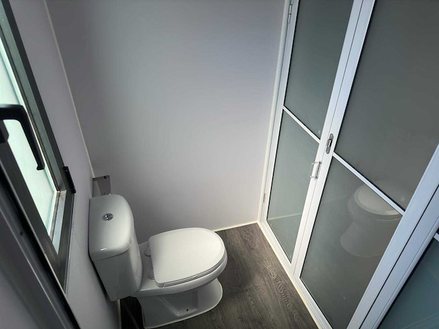 2025 rhino-cross-containers 1 deur en 3 ramen zwart 40ft hq/12 m - containerwoning / container office unit - afbeelding 21 van  35