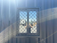 2025 rhino-cross-containers 1 deur en 3 ramen zwart 40ft hq/12 m - containerwoning / container office unit - afbeelding 33 van  35