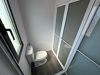 2025 rhino-cross-containers 1 deur en 3 ramen zwart 40ft hq/12 m - containerwoning / container office unit - afbeelding 19 van  35