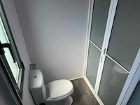 2025 rhino-cross-containers 1 deur en 3 ramen zwart 40ft hq/12 m - containerwoning / container office unit - afbeelding 20 van  35