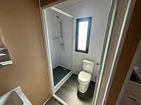 2025 rhino-cross-containers 1 deur en 3 ramen zwart 40ft hq/12 m - containerwoning / container office unit - afbeelding 24 van  35