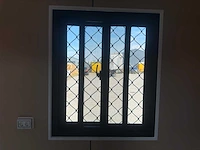 2025 rhino-cross-containers 1 deur en 3 ramen zwart 40ft hq/12 m - containerwoning / container office unit - afbeelding 28 van  35