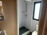 2025 rhino-cross-containers 1 deur en 3 ramen zwart 40ft hq/12 m - containerwoning / container office unit - afbeelding 13 van  35