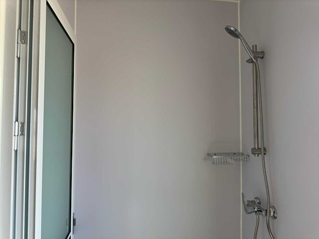 2025 rhino-cross-containers 1 deur en 3 ramen zwart 40ft hq/12 m - containerwoning / container office unit - afbeelding 26 van  35