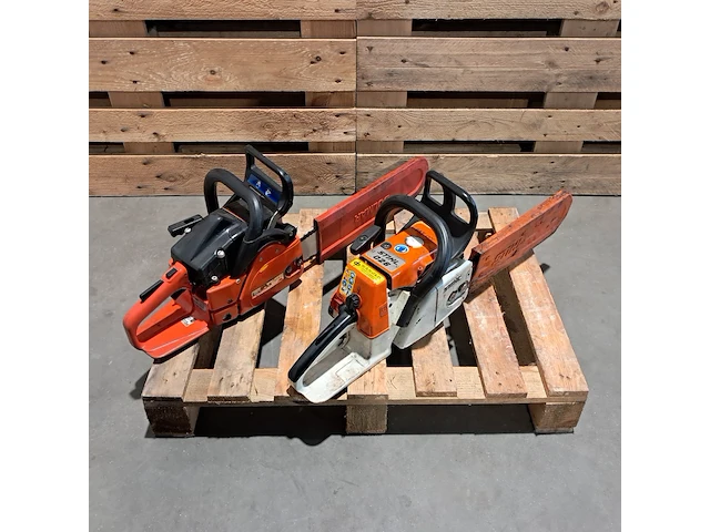 2x benzine kettingzaag, dolmar | stihl - afbeelding 1 van  12