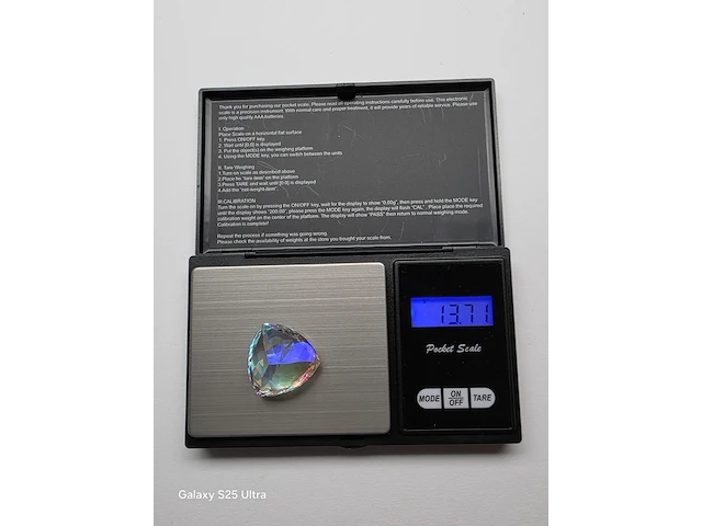 3x diamant 0,29 ct/ topaas 68,30 ct / ammoliet 20,55 ct - afbeelding 30 van  49