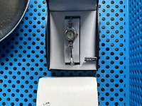 4 horloges en een koekepan - afbeelding 11 van  11