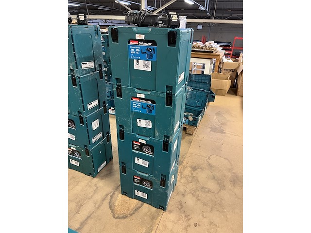 4x bouwgereedschap, 1x 18v accu, 1x lader, m-boxen makita, 2x dhs630zj, 2x dhr242zjv - afbeelding 1 van  4