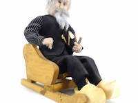 Abraham op houten stoel