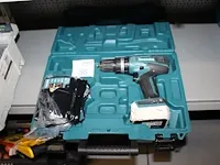 Accu schroefboormachine makita type hp 347 d 14,4 volt met accu en lader in koffer.