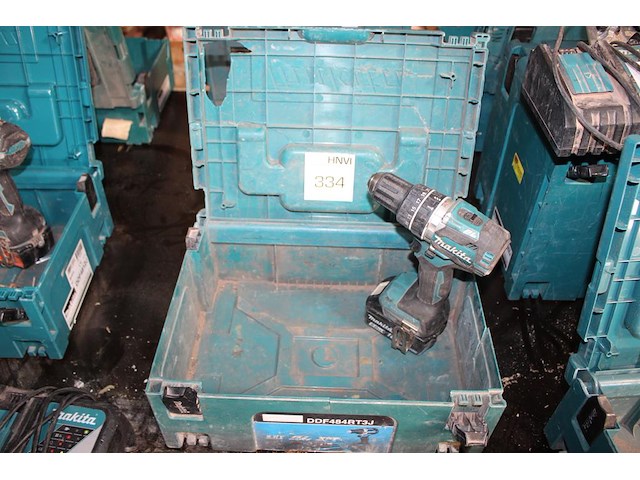 Accu schroefmachine met accu in kunststof koffer. - afbeelding 1 van  2