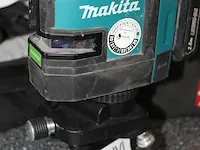 Acculaser makita sk105gd op in hoogte verstelbaar statief met accu en draagtas. - afbeelding 3 van  5