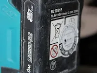 Acculaser makita sk105gd op in hoogte verstelbaar statief met accu en draagtas. - afbeelding 5 van  5