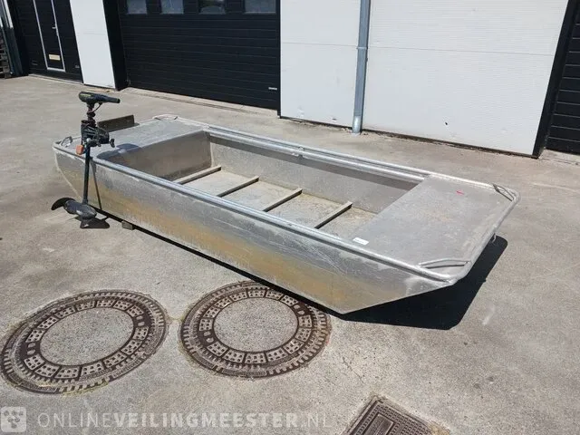 Aluminium boot met elektrische buitenboordmotor minn kota - afbeelding 1 van  12